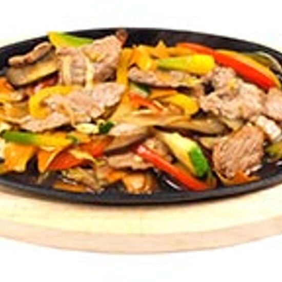 Свинина с овощами под соусом «Бутанику»