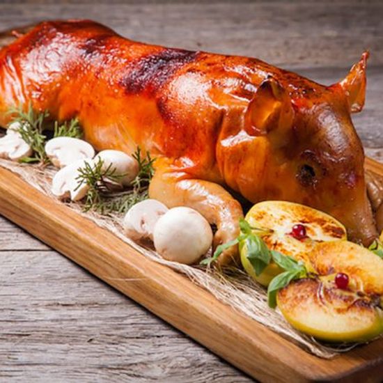 Поросенок, фаршированный гречневой кашей с белыми грибами