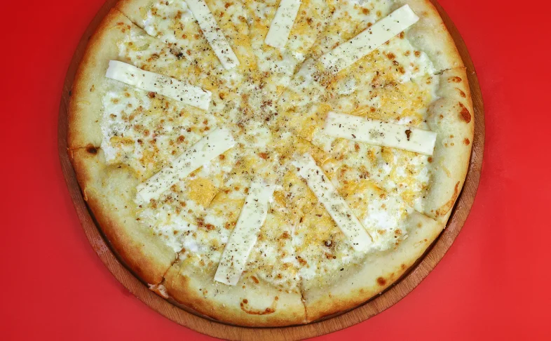 Пицца «Четыре сыра»