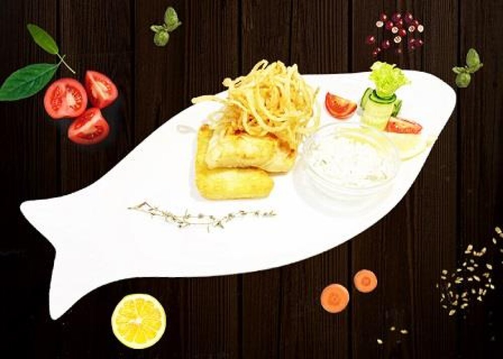 Филе Судака, запеченное на картофельном драннике с соусом "Тар-Тар"