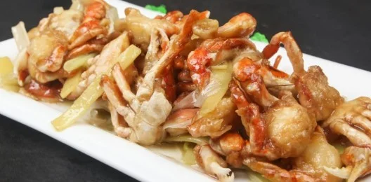 Камчатский краб в луковом соусе