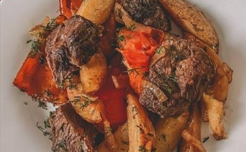 Говядина тушеная с овощами