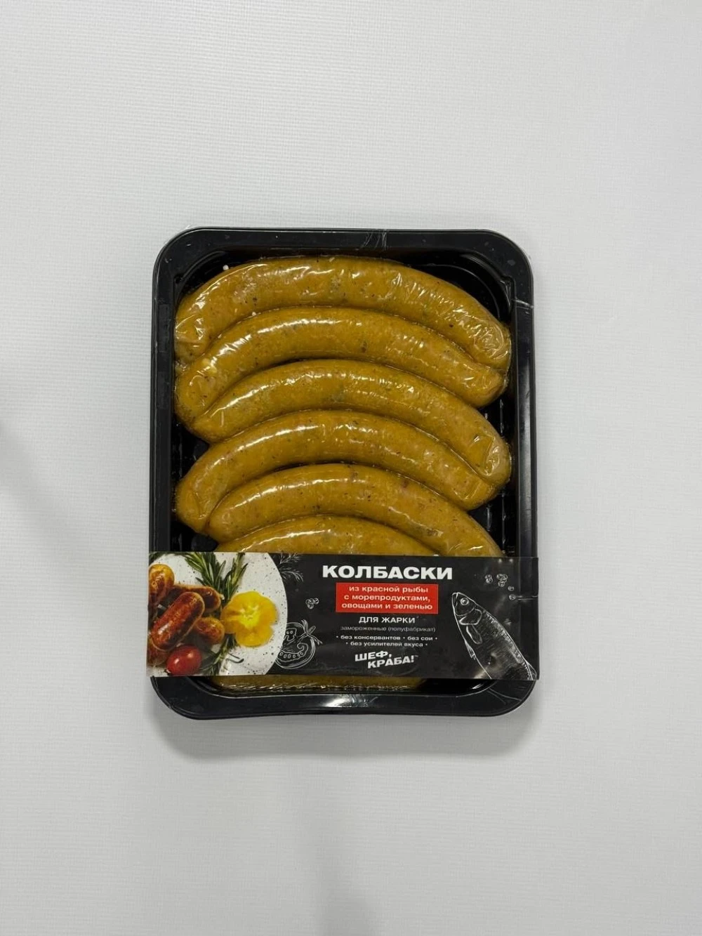 Колбаски из красной рыбы с морепродуктами, овощами и зеленью