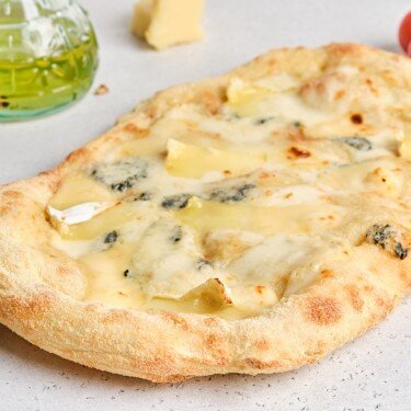 Пицца четыре сыра